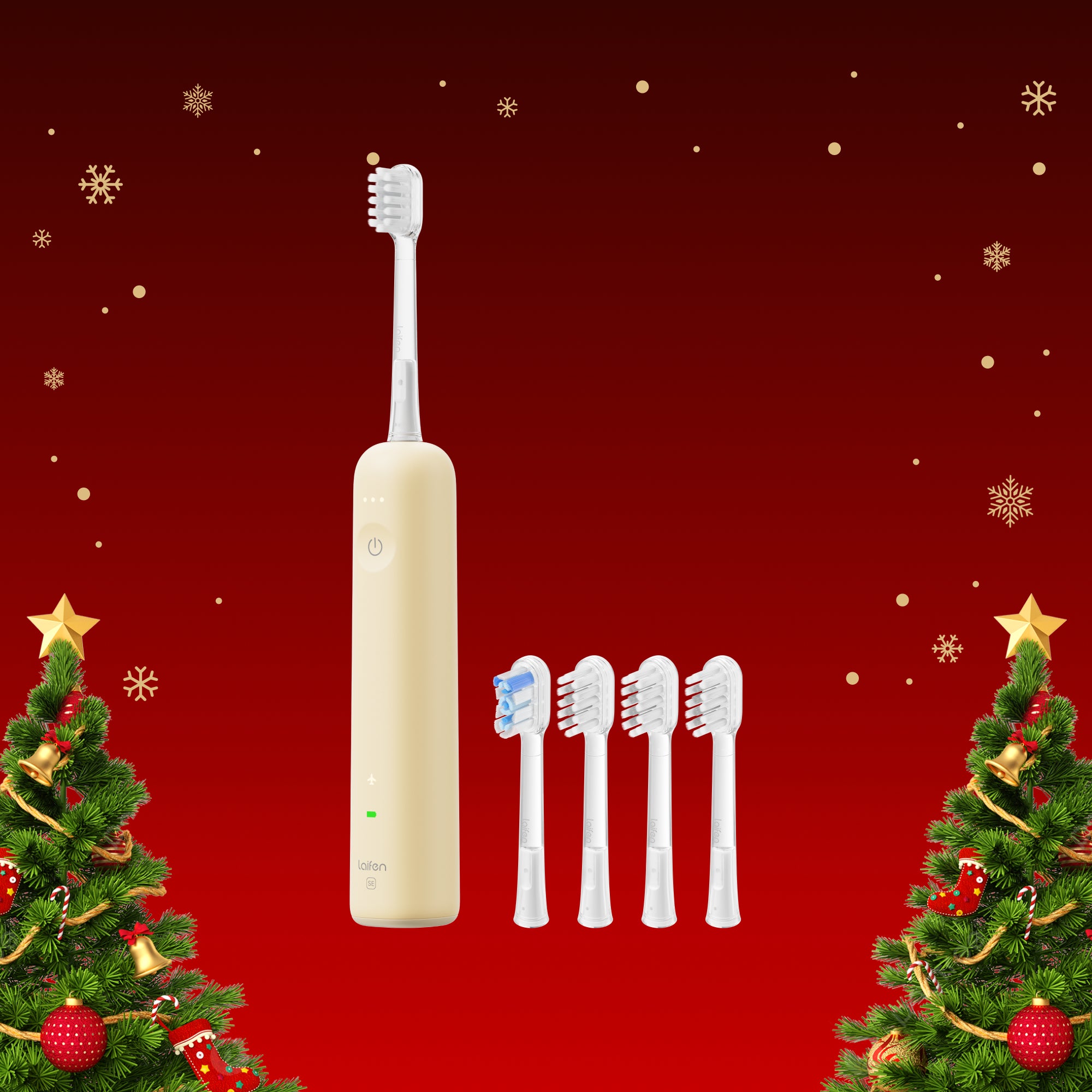 Elektrische Zahnbürste in Cremeton mit mehreren Ersatzbürstenköpfen